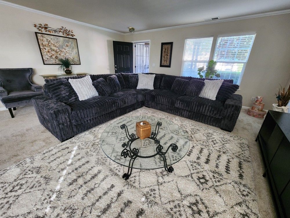 Dark GREY Jumbo Sectional . Picture Is Customer. You Get New