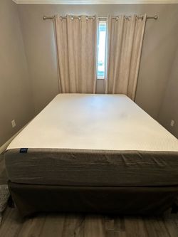 Queen mattress and box spring lightly used in guest room