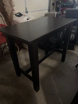 Dark brown tall table