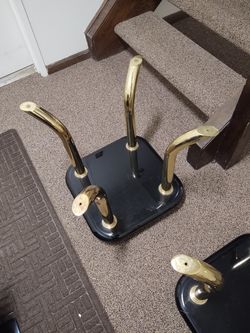 Black and gold onyx table stands with glass