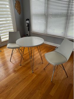 Small white cafe table