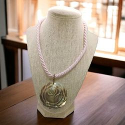 Carved Mother of Pearl flower pendant on cord necklace, unusually pretty