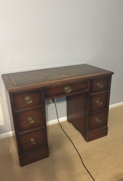 Antique leather top desk.