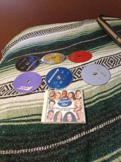 6 dvds movies and 1 music cd for sale