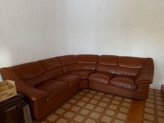 Leather sectional w/ twin bed