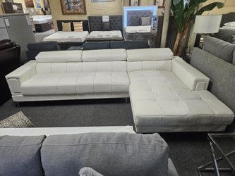 Brand new white faux leather sectional (112"x85")