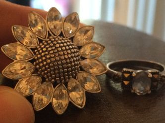 Large flower ring and small blue stone ring