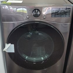 Lg Front Load Washer And Electric Dryer  Brand New  Scratch And Dent  1 YEAR WARRANTY 
