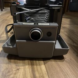 Vintage Polaroid 230 automatic land camera
