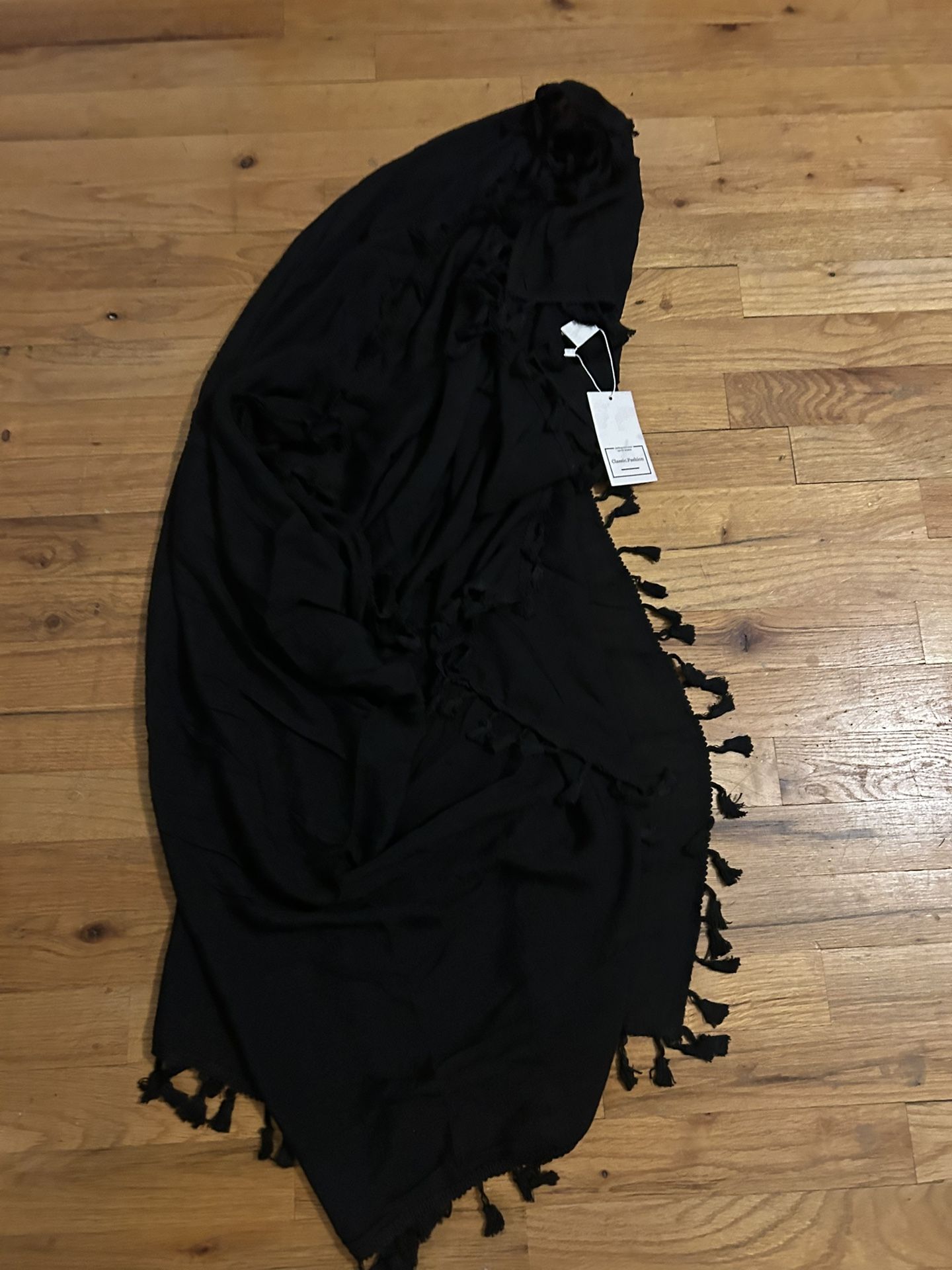 Beach coverup/sarong new with tags one size. Black, long, tie to fit.