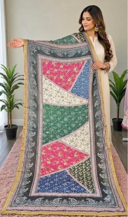 Multi-colored patchwork shawl with geometric and floral motifs in pink, blue, green, and white #patchwork #geometric Let me know which one you would