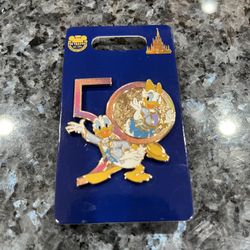 Disney Pin Walt Disney World 50th Anniversary Donald and Daisy Duck Trading Pin.  Size approximately 1 3/4 inches long / 1 1/2 inches wide.  Brand new