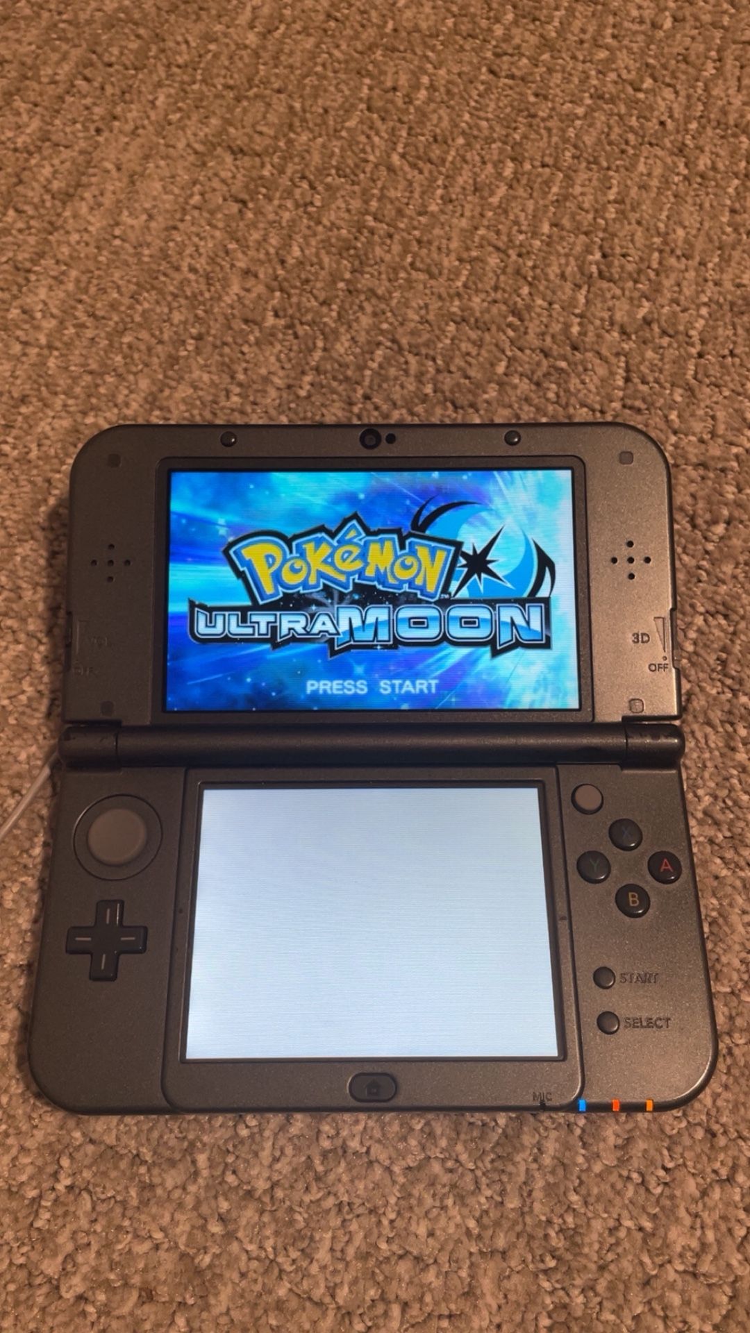 New Nintendo 3DS XL – Black – Pokémon Ultra Moon + Games