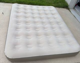 Selling a Coleman Queen air mattress with battery-powered pump.