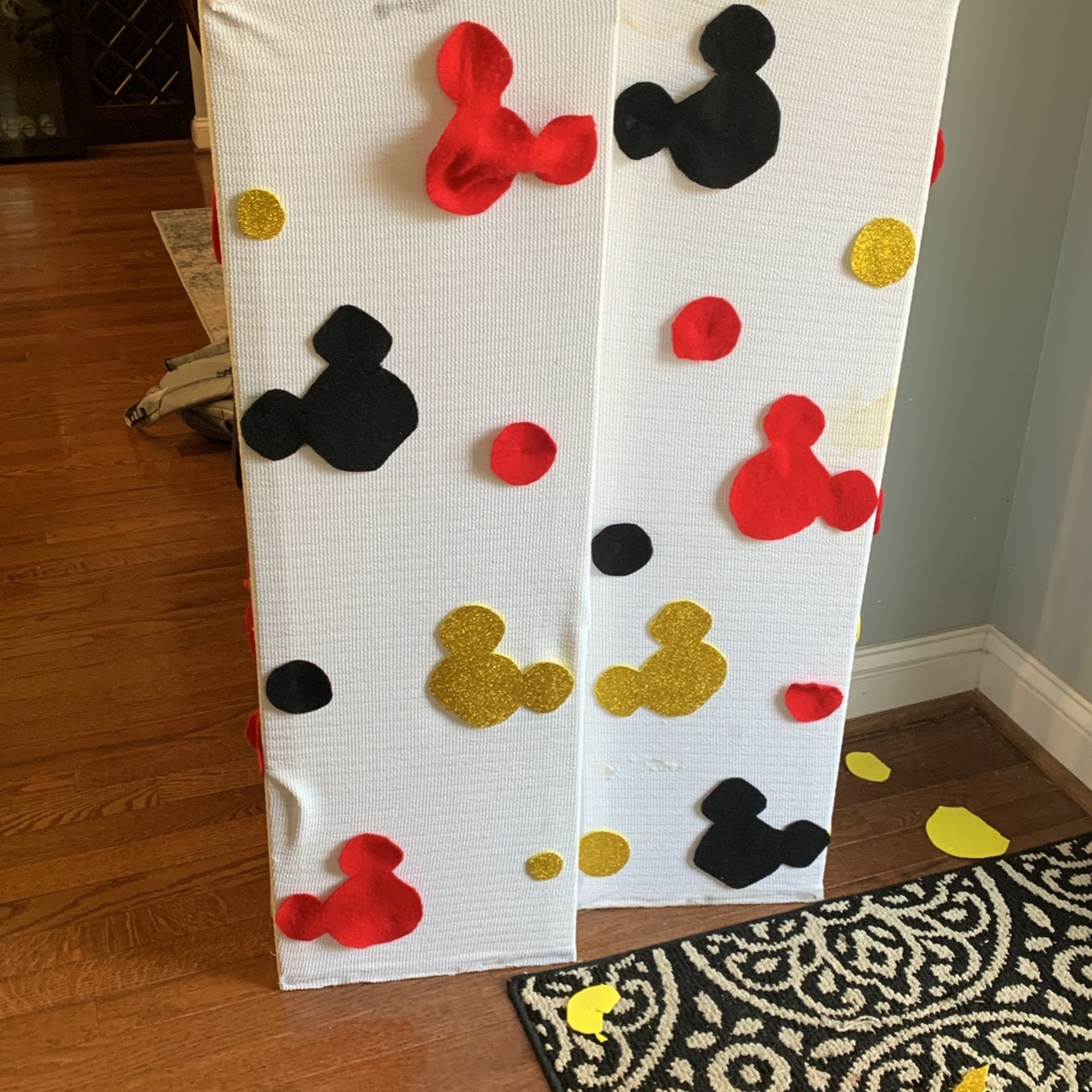 columns with mickey mouse decorations for bday party . 