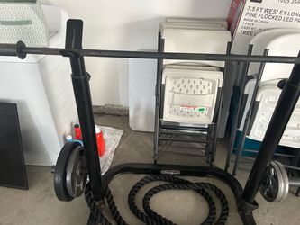 Weight lifting rack and bar for sale