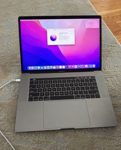 MacBook Pro 15” Touch Bar 2.7ghz i7 16gb ram 500gb