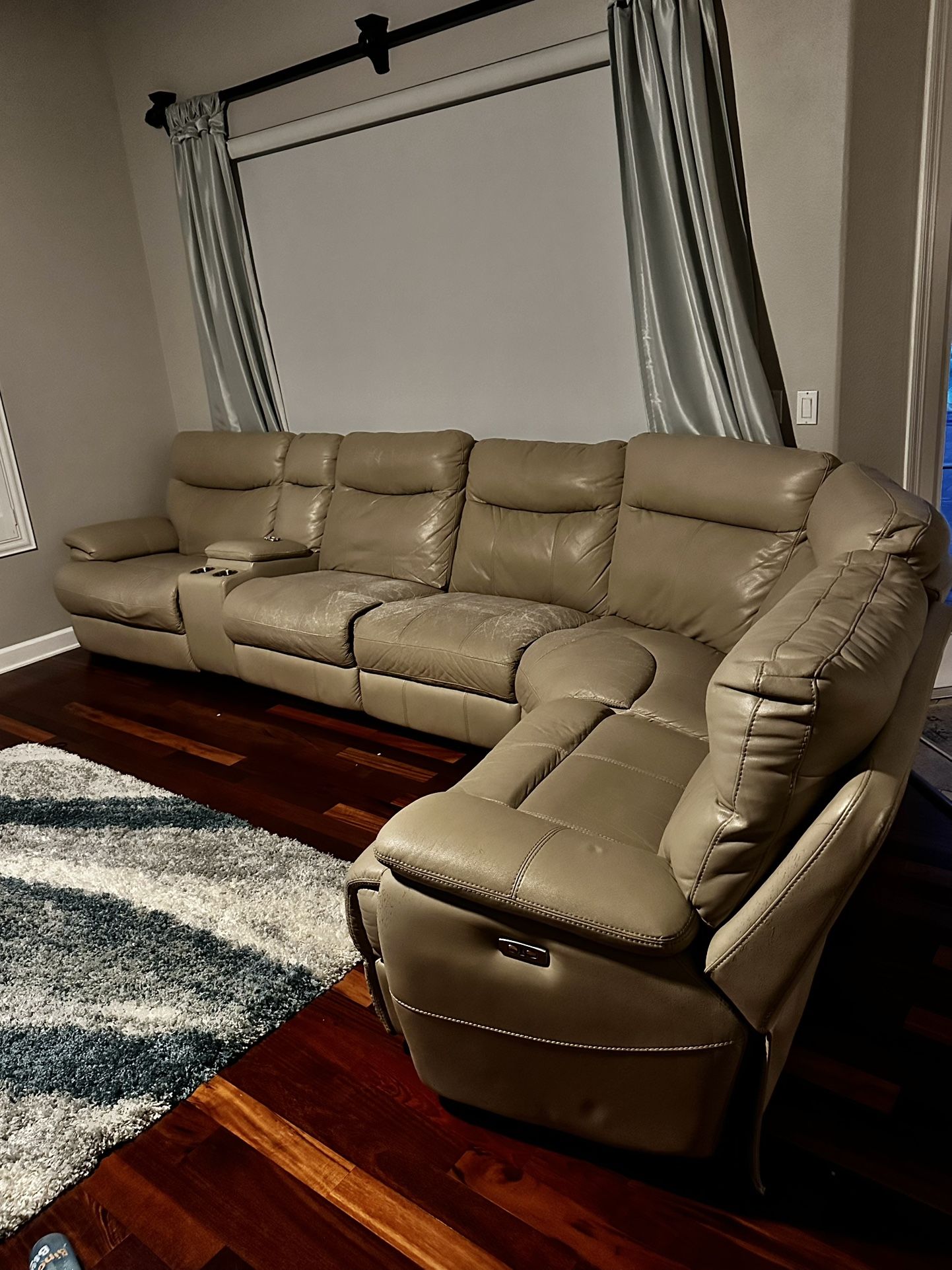 Leather modular couch 6 Pieces (2 Power Recliners, 1 Manual, 1 Cup holder/storage Unit)