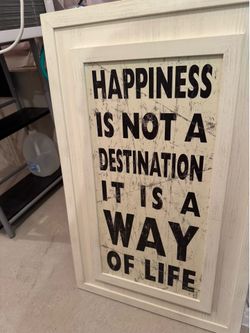 Happiness is not a destination wall sign