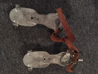 Vintage Roller Skates with 2 keys and leather straps good condition compared to others available. $16-