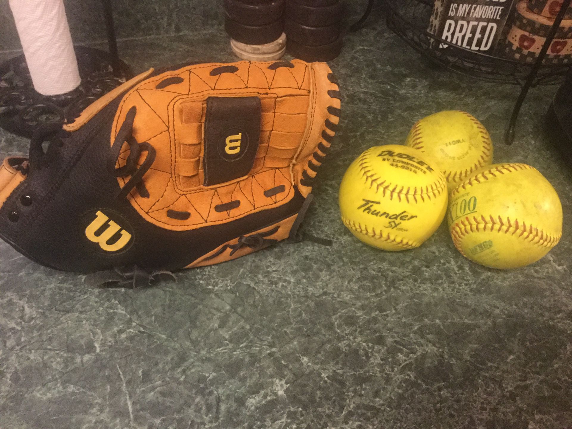 Wilson A2581 model softball glove 13” like new with over size pocket. Comes with 3 softballs