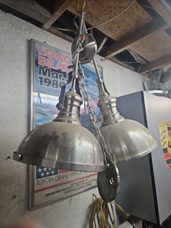 2 brushed metal light fixtures