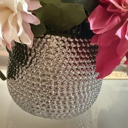 two pots of artificial flowers