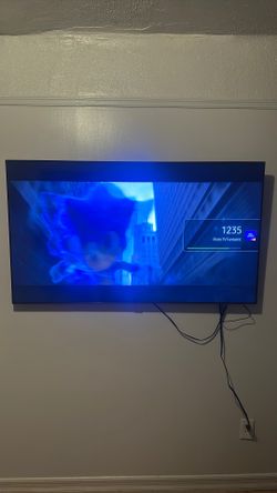 65 inch Samsung Smart TV with wall mount