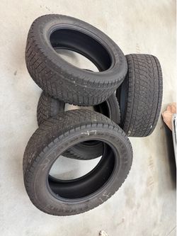 4 studded snow tires - 275/55/R20