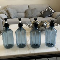 empty plastic bottle dispenser / soap dispenser