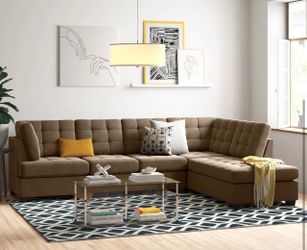 Brown chenille sectional couch and ottoman