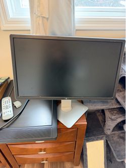 22 inch TV with remote control and  dell monitor