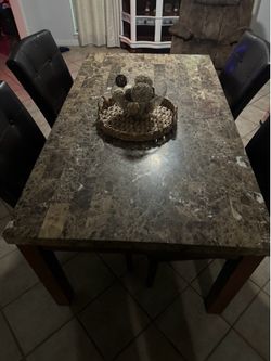 Table w /4 chairs 66inches long  38 1/4 width  31 inches height