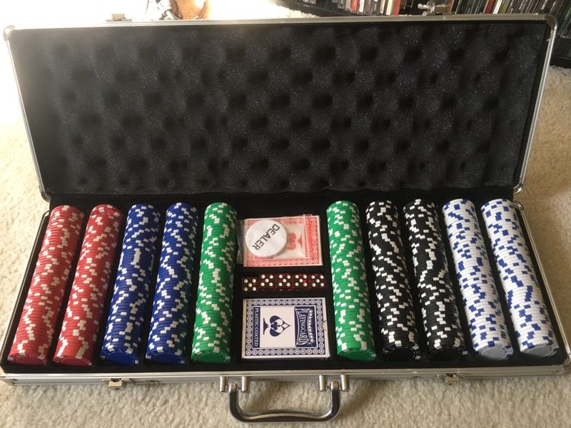 Full unused professional poker set, with portable table top and carrying bag.