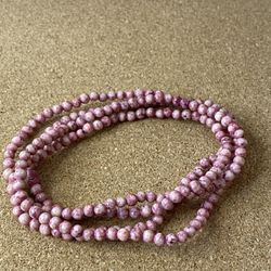 Natural stone mauve tone pink beads necklace can be worn as a bracelet