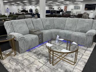 Gray plush fabric 3 Pc Power reclining Sectional w/speaker & console