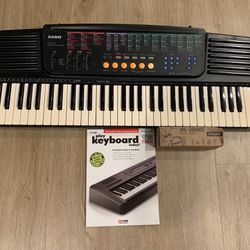 Casio Keyboard + Book And D Batteries