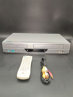 Zenith, VCR/DVD Player with remote and cable.  Works fine!