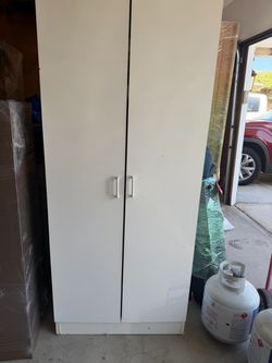 Tall White Two-Door Storage Cabinet