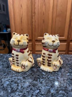 Ceramic Vintage Ceramic Tabby Cat Salt and Pepper Shakers.  Size approximately 4 inches tall.  Brand GKRO, Brand new never used stickers on the bottom