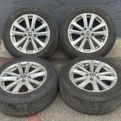 Nissan Altima 16-inch aluminum wheels with old tires, fits Sentra, Maxima, Infiniti, and more