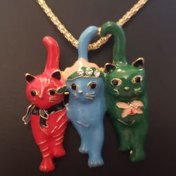 NEW Cat Trio Necklace.  Back of the Pendant is a pin so can also be worn as a Brooch.  Pendant is approximately 2" long x 1.5" wide. Pendant has Red, 
