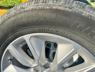 275/60 R20 Tire on Silver Alloy Wheel