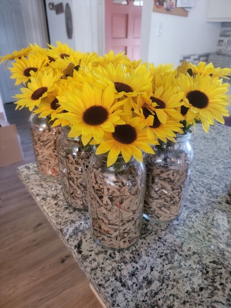6 sunflower bouquets in Large Mason jars 