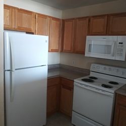 set refrigerator, stove, dishwasher, microwave