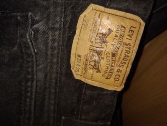 Levi's classics one pair black one pair yellow 33 waist $20 for both or $15 for one
