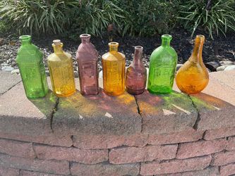 Vintage Wheaton Glass Company Bottles Vibrant Colors & Shapes
