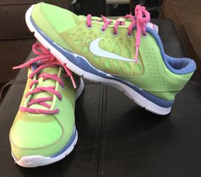 Nike green With pink laces size ladies 8.5 super cute
