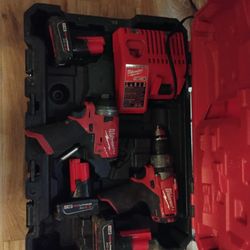Milwaukee Impact And Drill Set With 3 Batteries And Charger