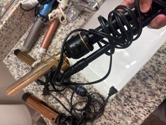 Gold Curling Iron with Black Handle
